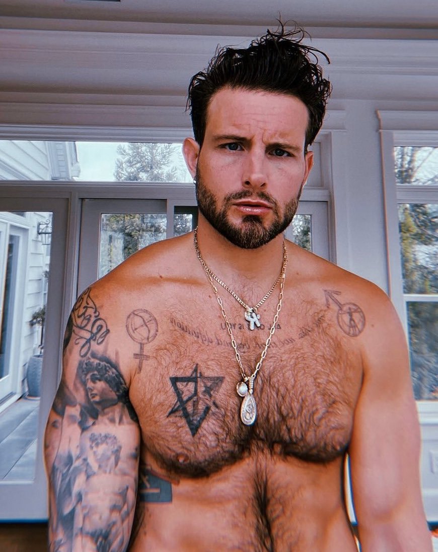 Nico Tortorella chest geometric tattoos