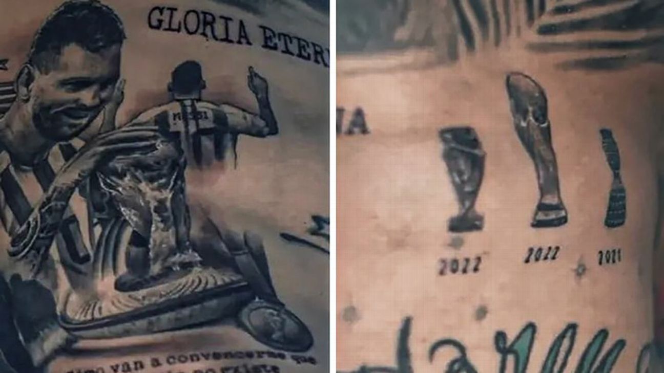 Nicolas Otamendi tattoo showing Argentina trophies and Gloria Eterna lettering