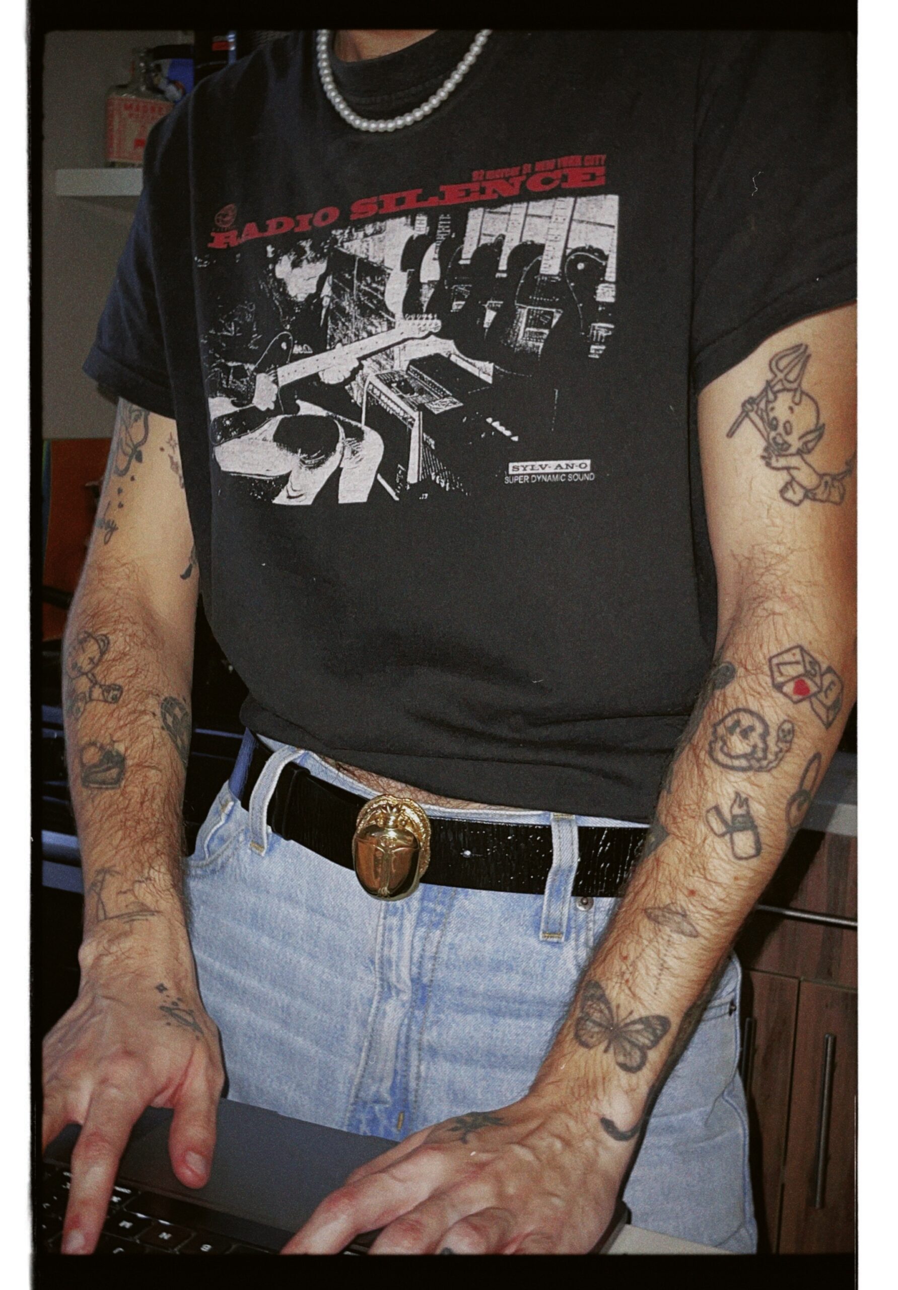 Nicolas McCoppin full arm tattoo coverage with hand designs