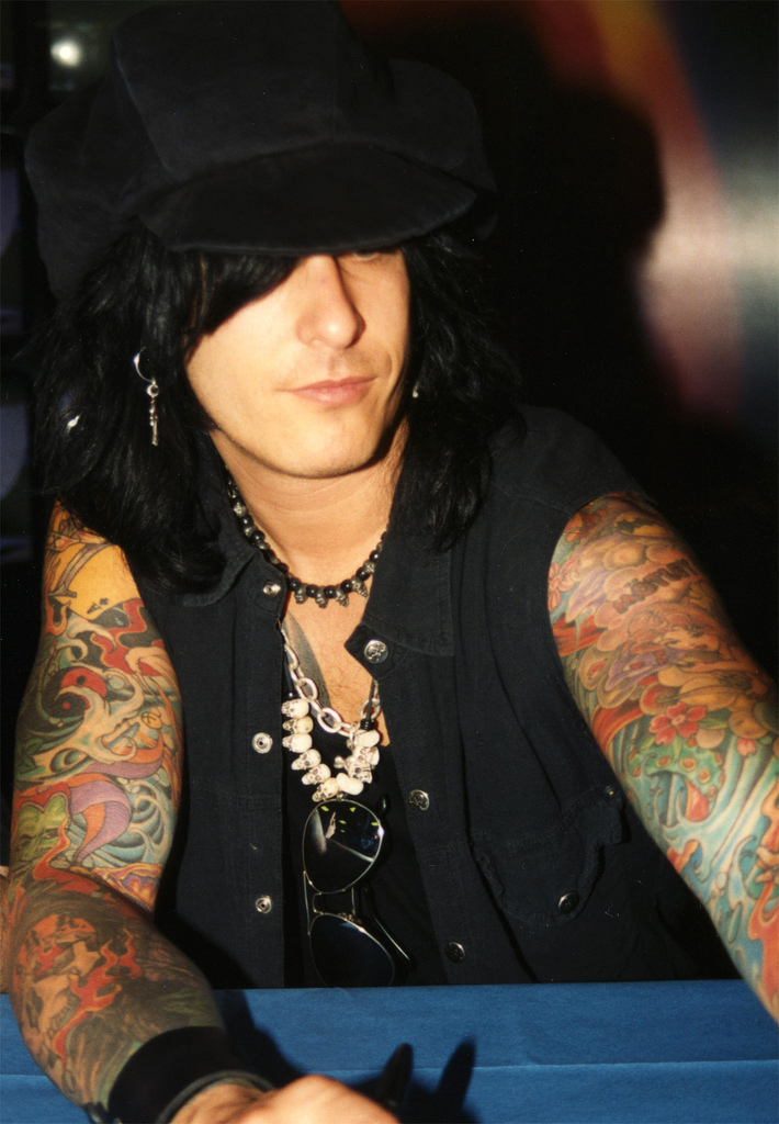 Nikki Sixx colourful sleeve tattoos