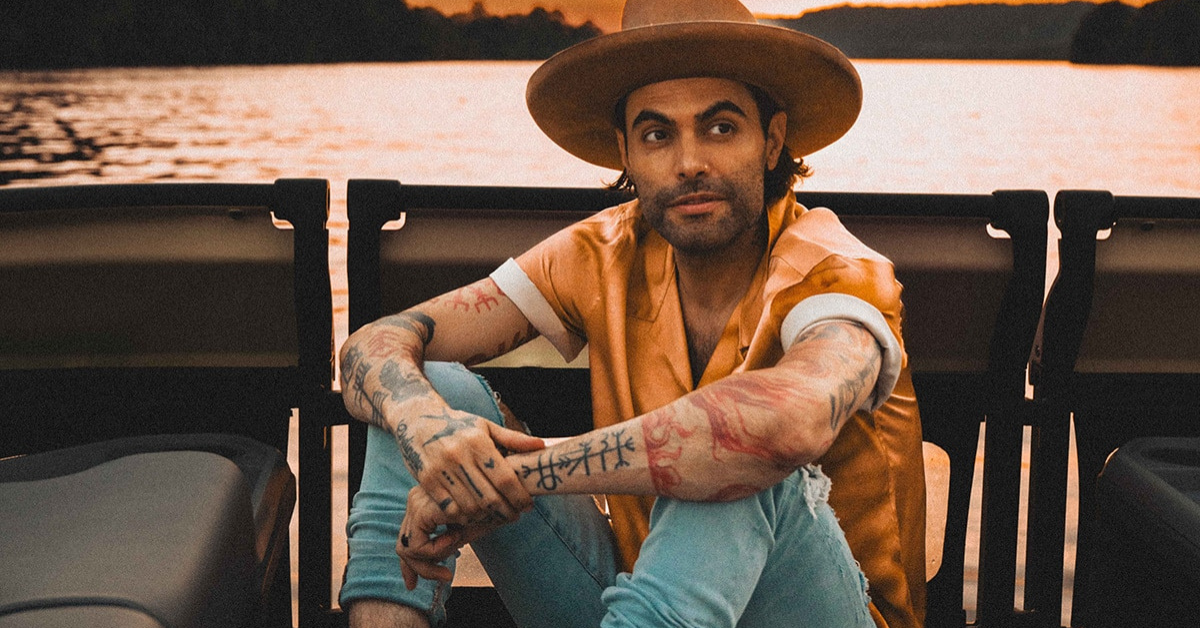 Niko Moon arm symbol tattoos