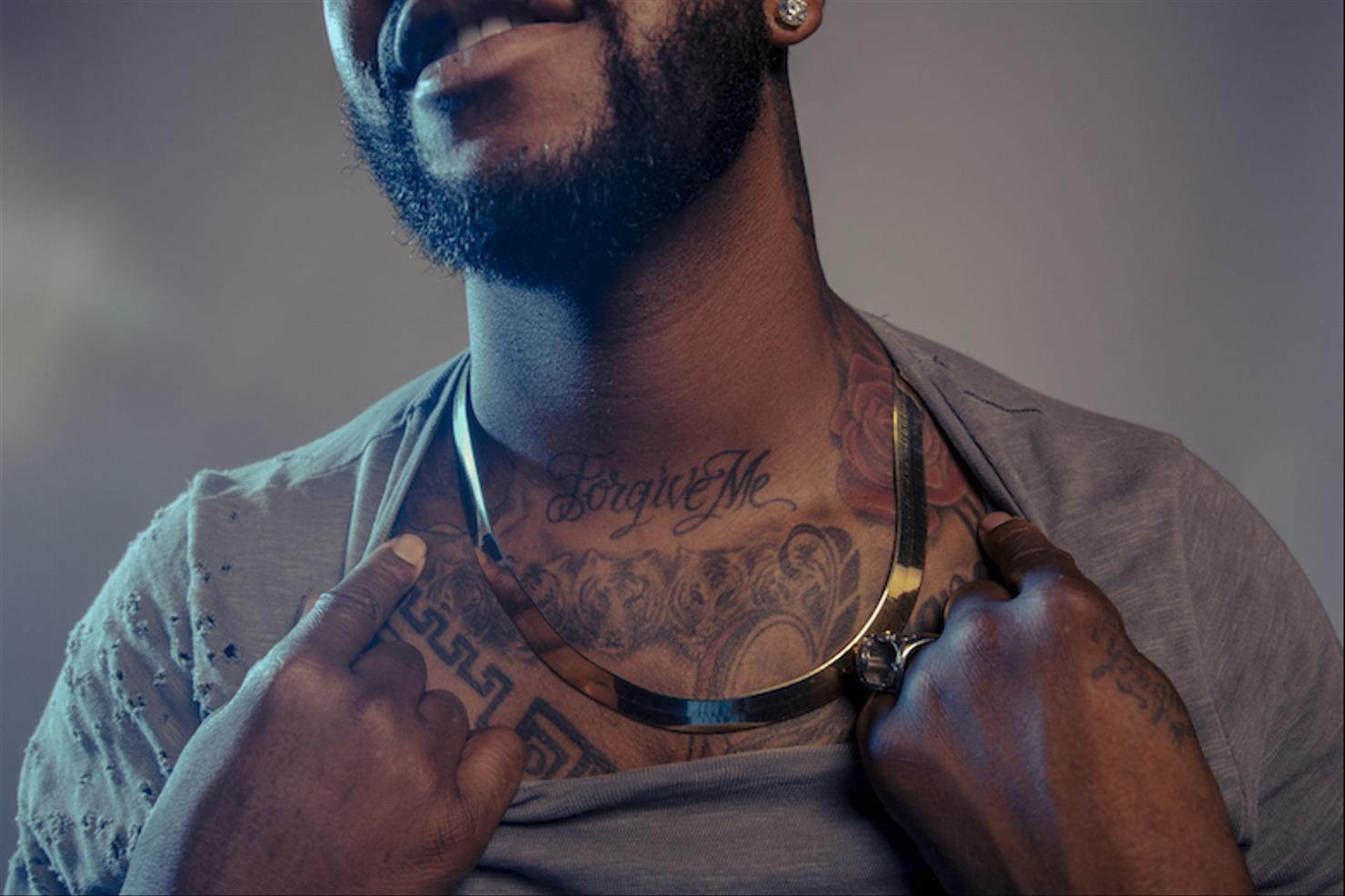 Omarion Forgive Me chest tattoo