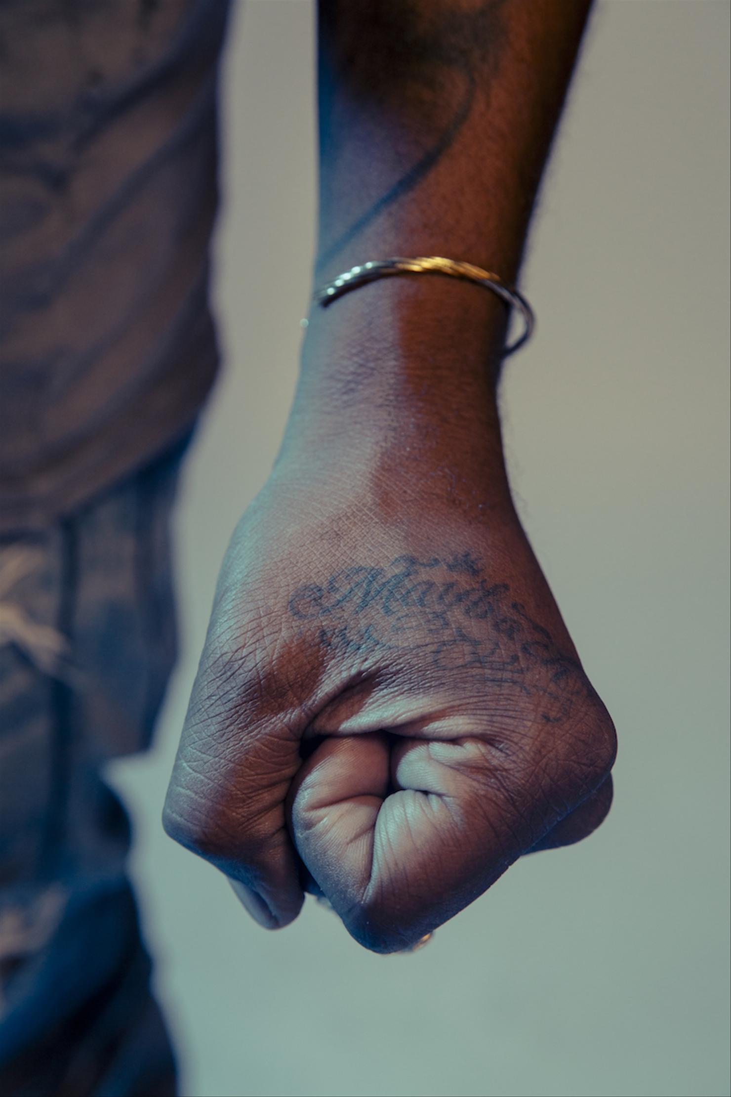 Omarion Maybach O hand tattoo
