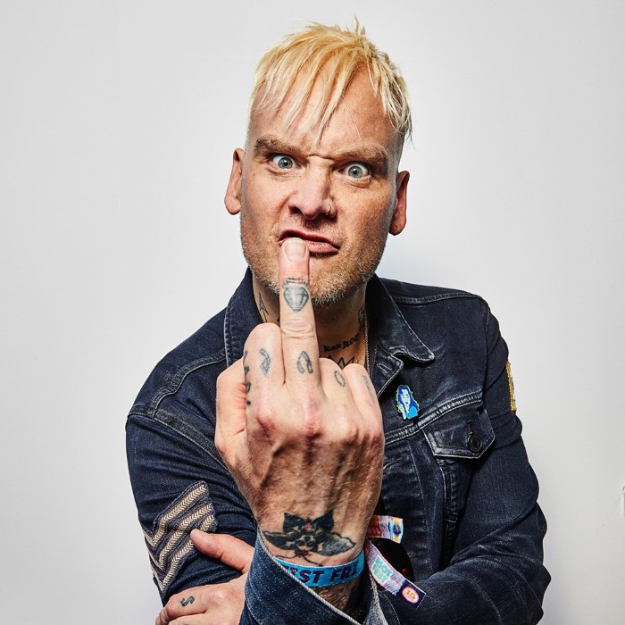 Matt Skiba with visible hand and neck tattoos