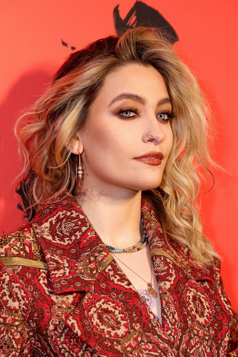 Paris Jackson light from the shadows neck tattoo