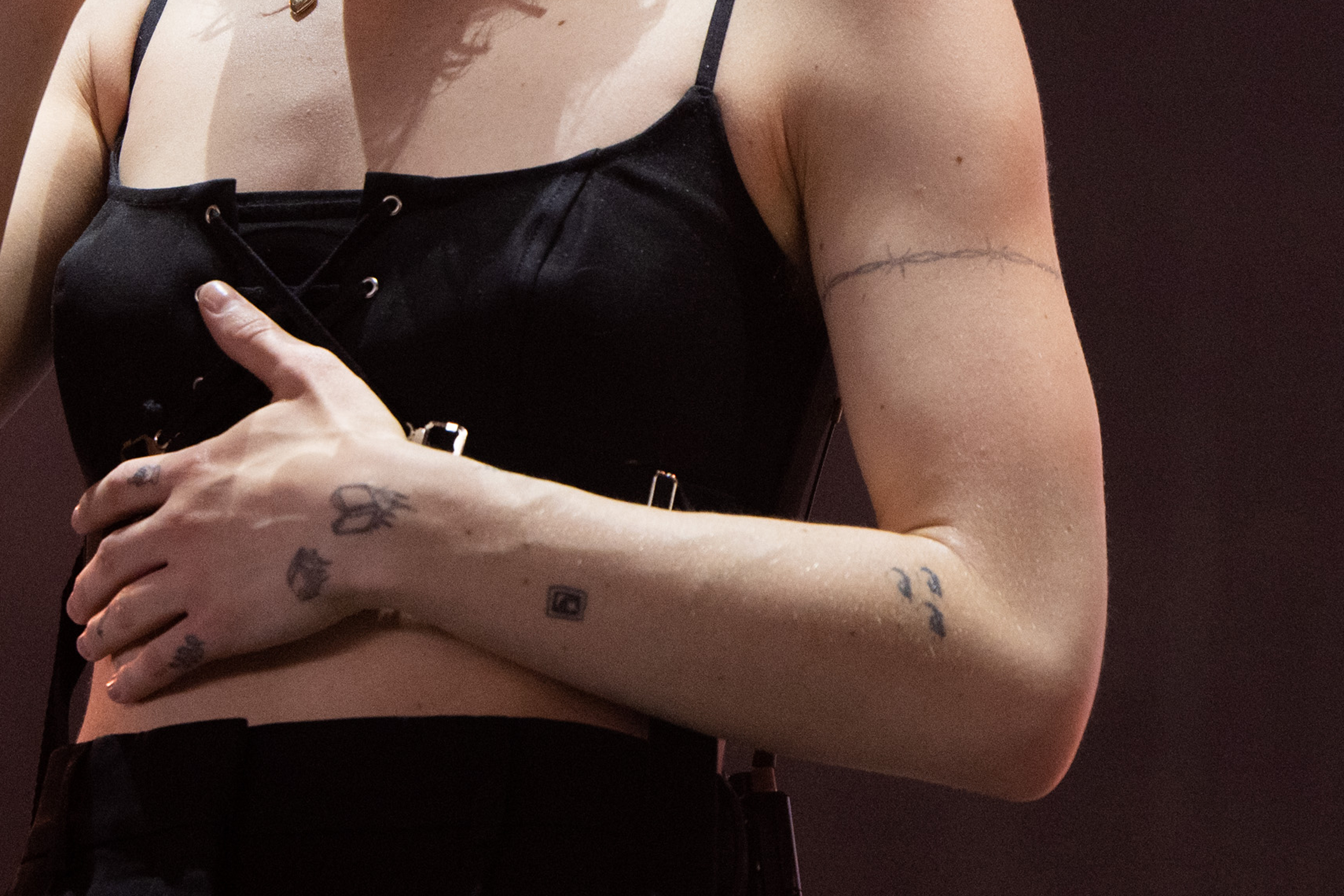 Phoebe Bridgers arm tattoos at Coachella