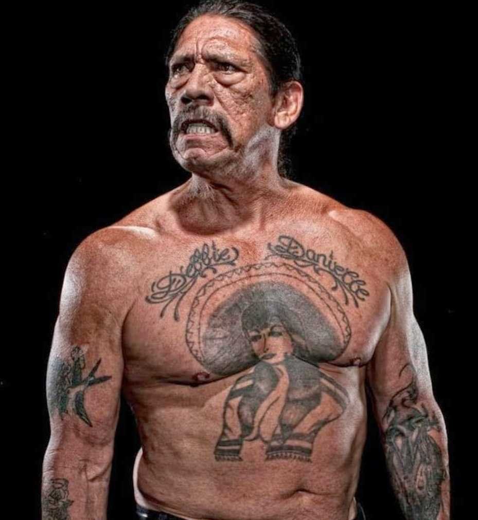 Danny Trejo chest tattoo with family lettering