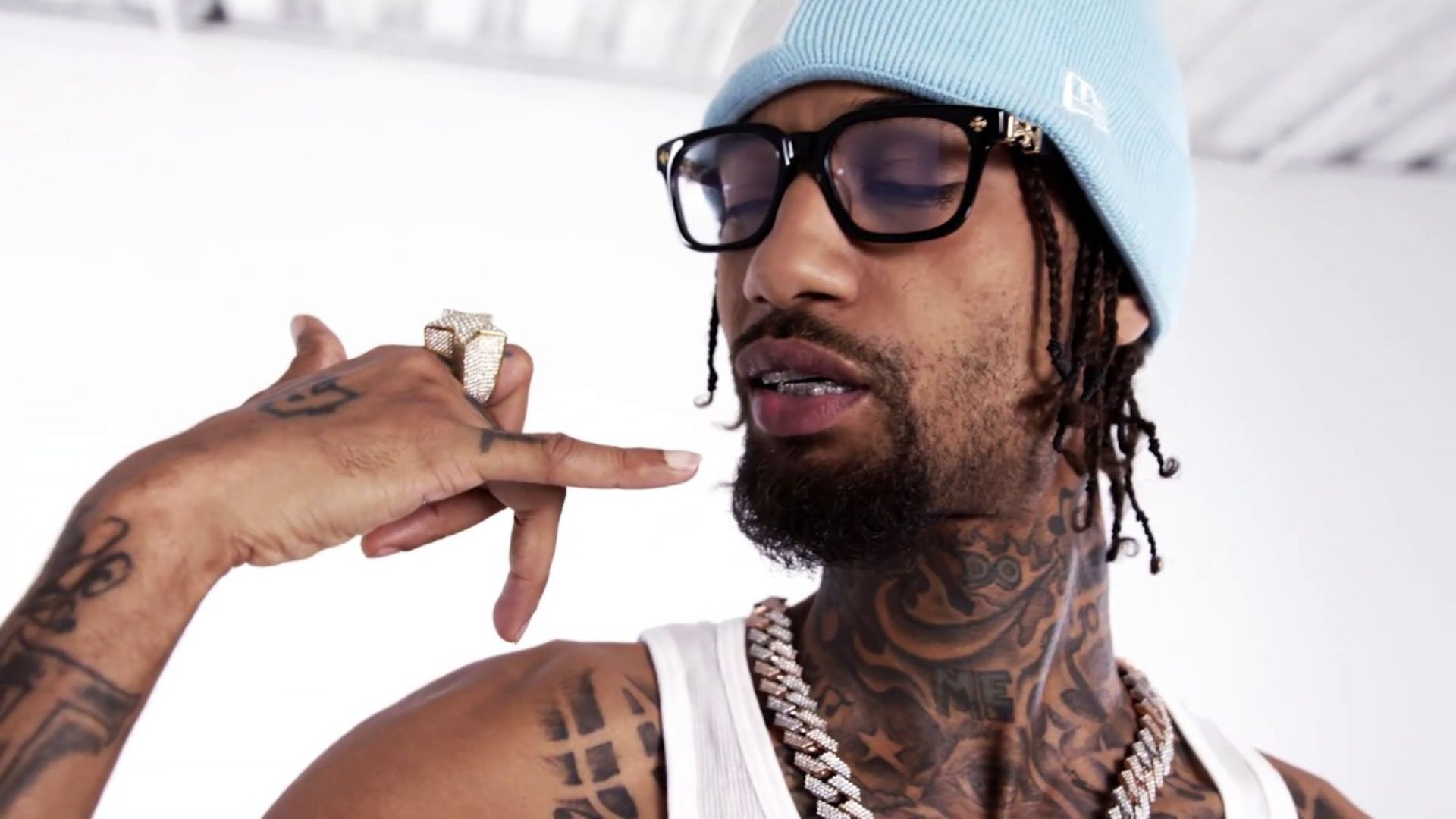 PnB Rock GQ tattoo concerns and hand ink