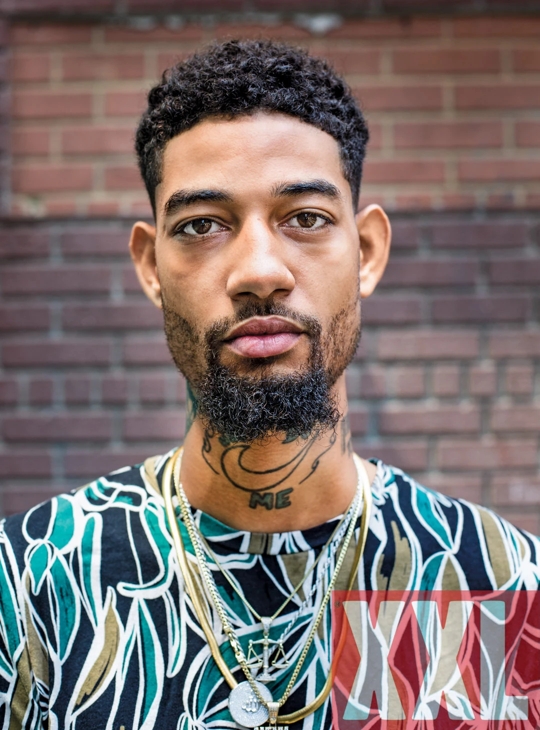 PnB Rock neck tattoo portrait