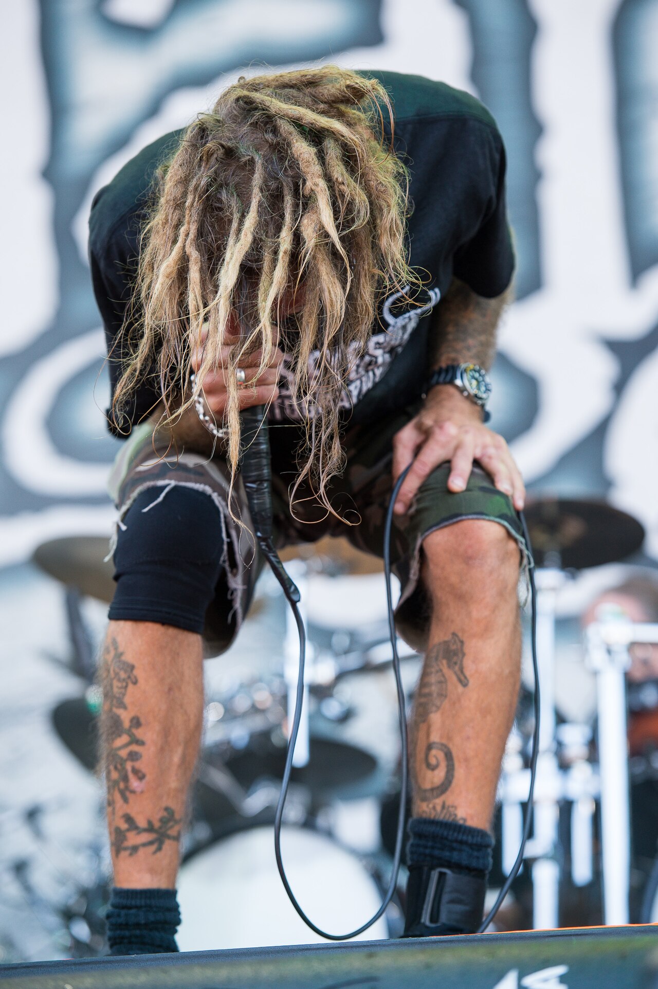 Randy Blythe leg tattoos close view