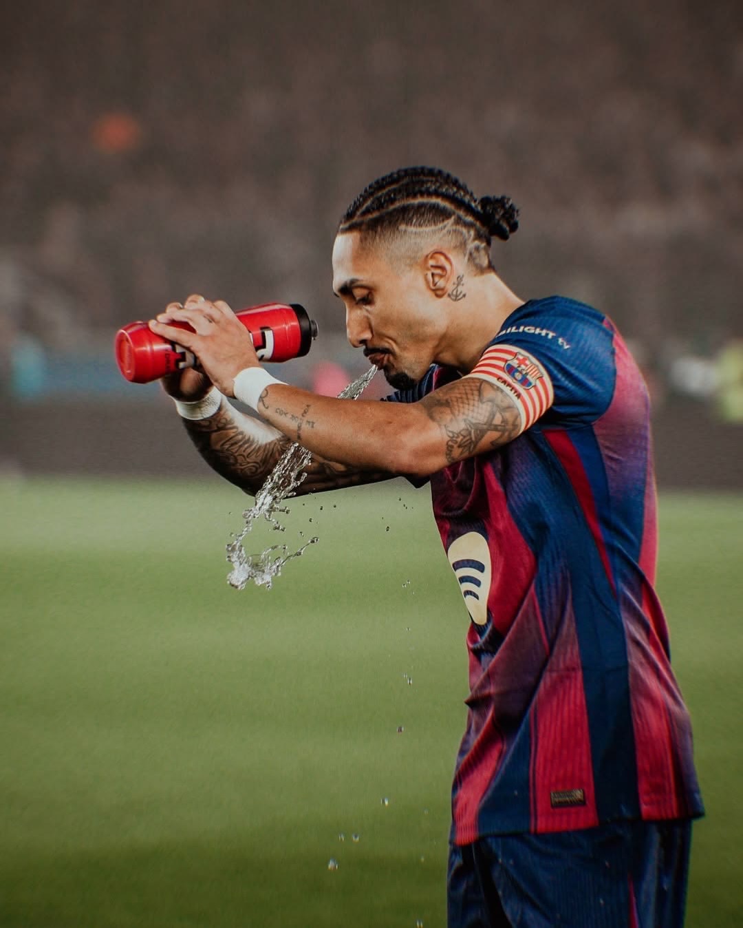 Raphinha tattooed arms and football themed body art