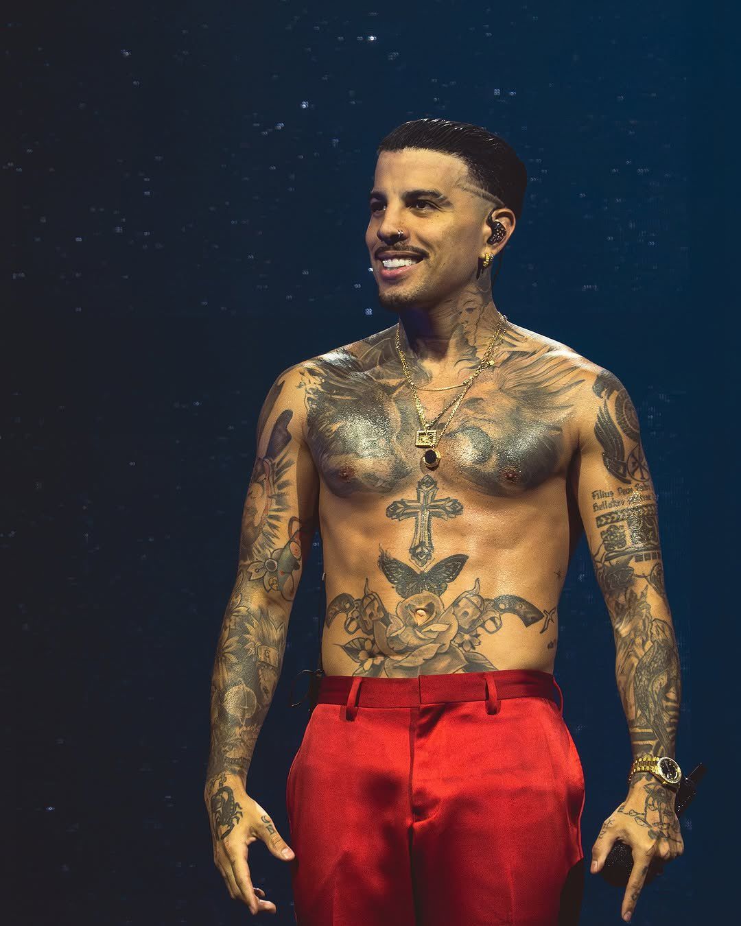 Rauw Alejandro stage tattoos