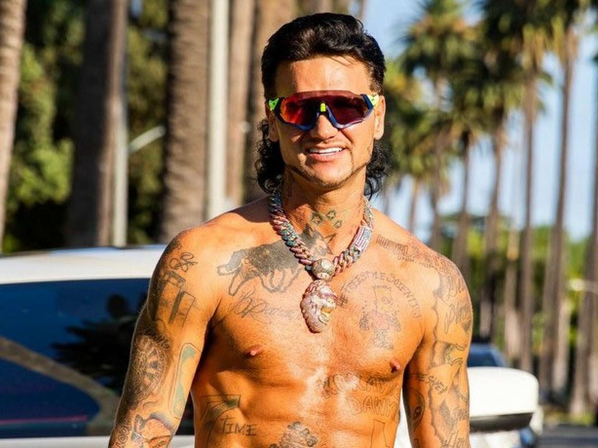 Riff Raff H Town shoulder tattoos