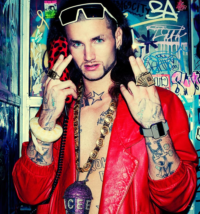 Riff Raff hand arm and rib tattoos