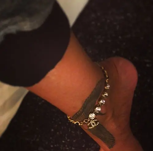 Rihanna Egyptian falcon ankle tattoo