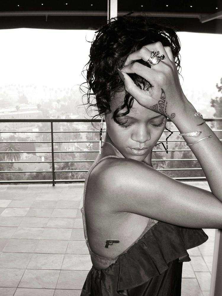 Rihanna handgun tattoo on her ribcage