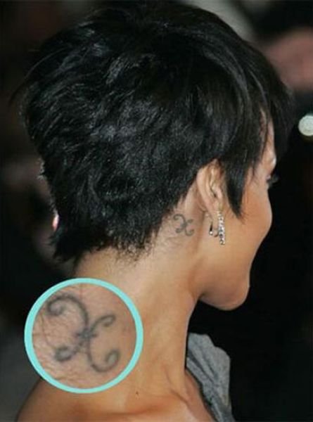 Rihanna Pisces tattoo behind her ear