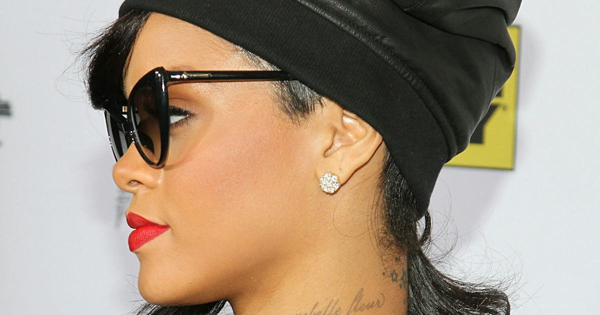 Rihanna Rebelle Fleur neck tattoo