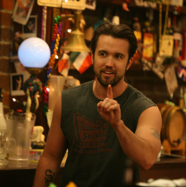 Rob McElhenney's older feather and eagle tattoos on his upper arms