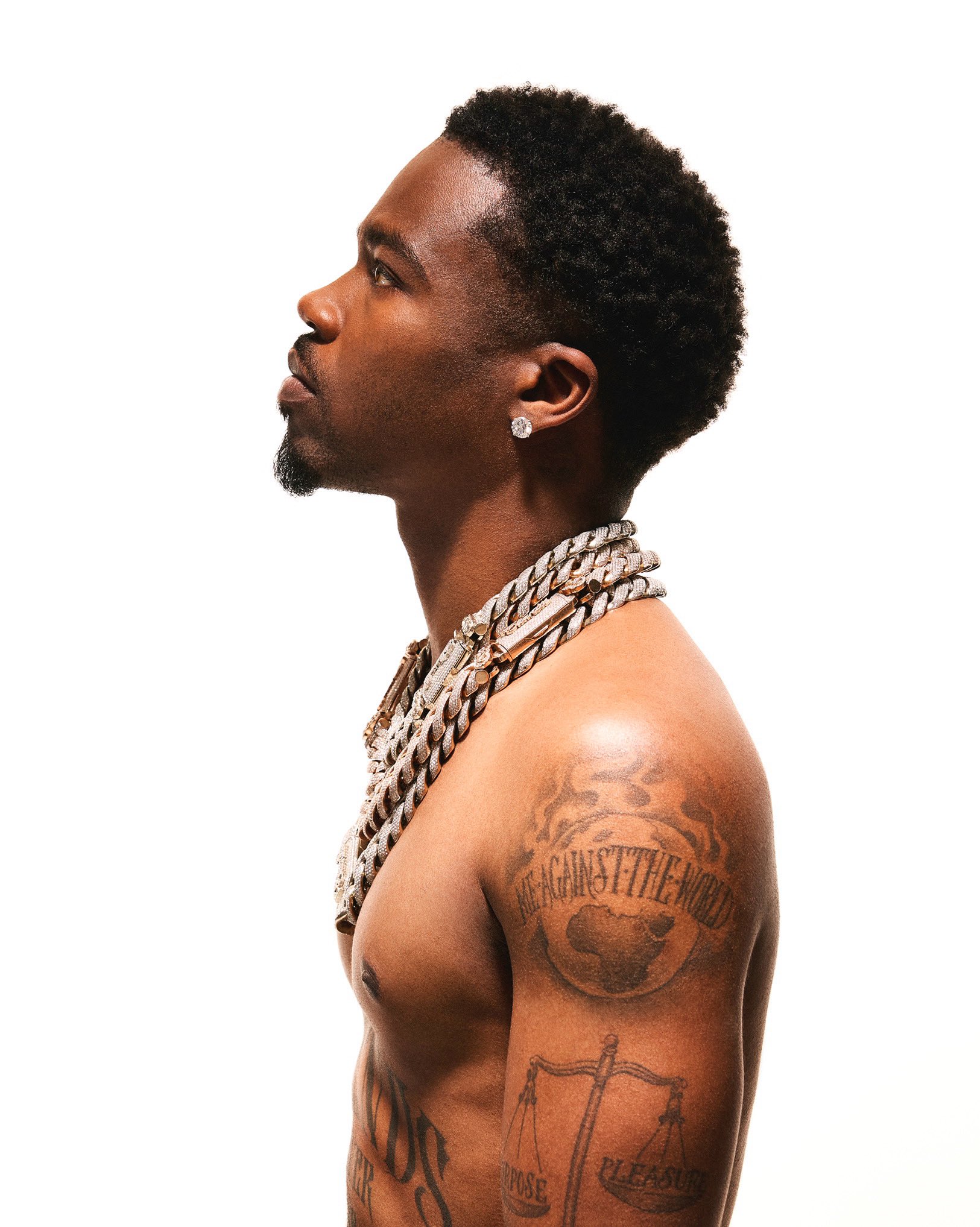 Roddy Ricch shoulder and arm tattoos