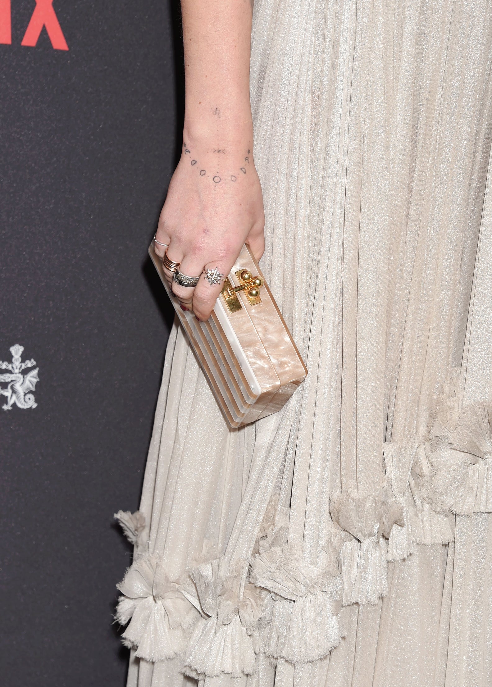 Rumer Willis moon phases wrist tattoo