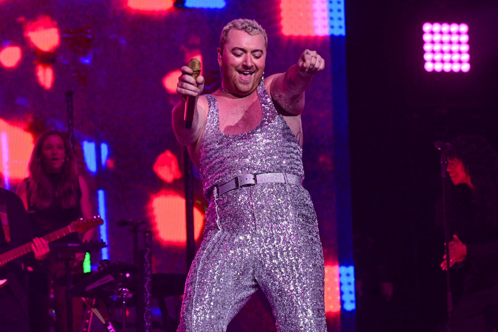 Sam Smith arm tattoos on stage