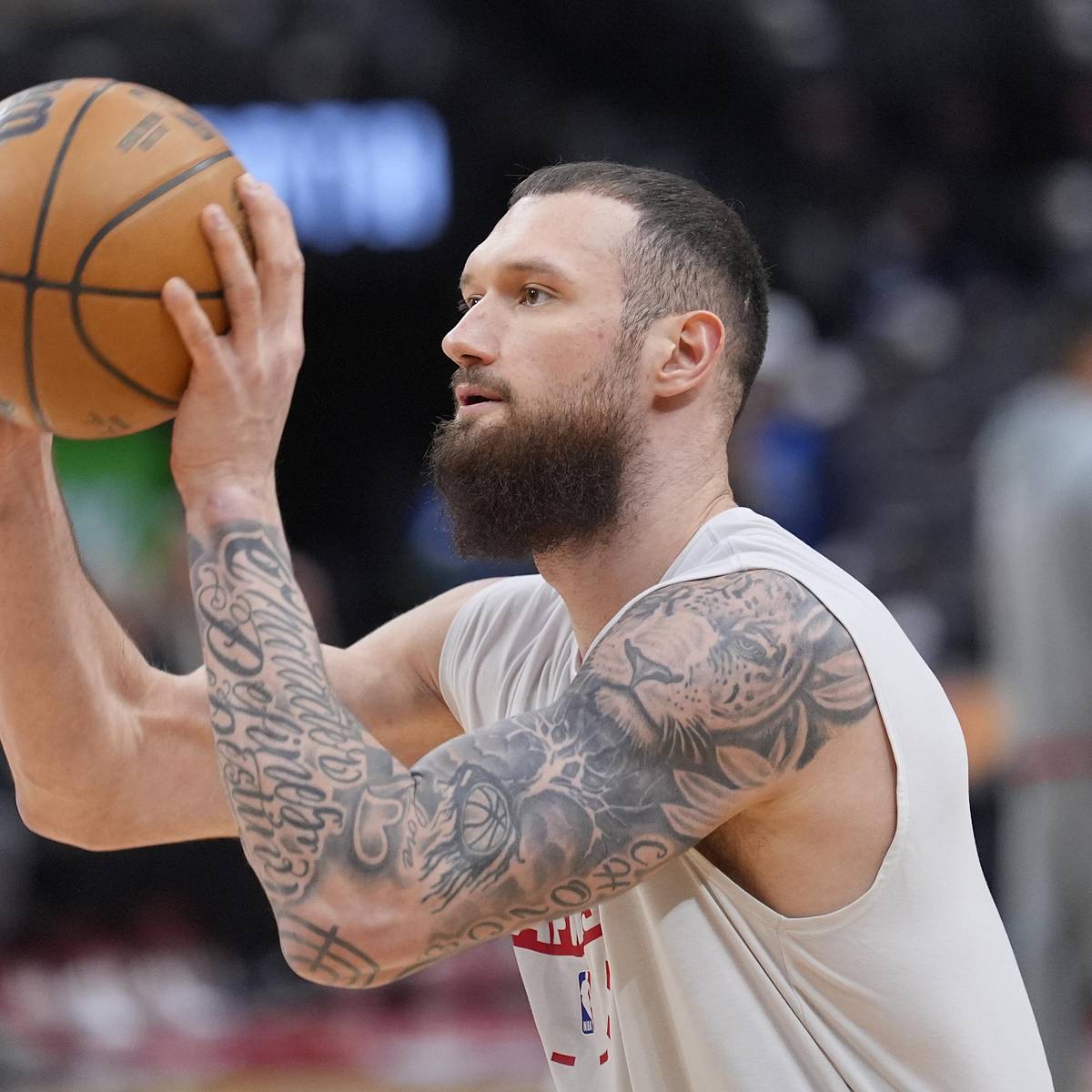 Sandro Mamukelashvili arm tattoos in action