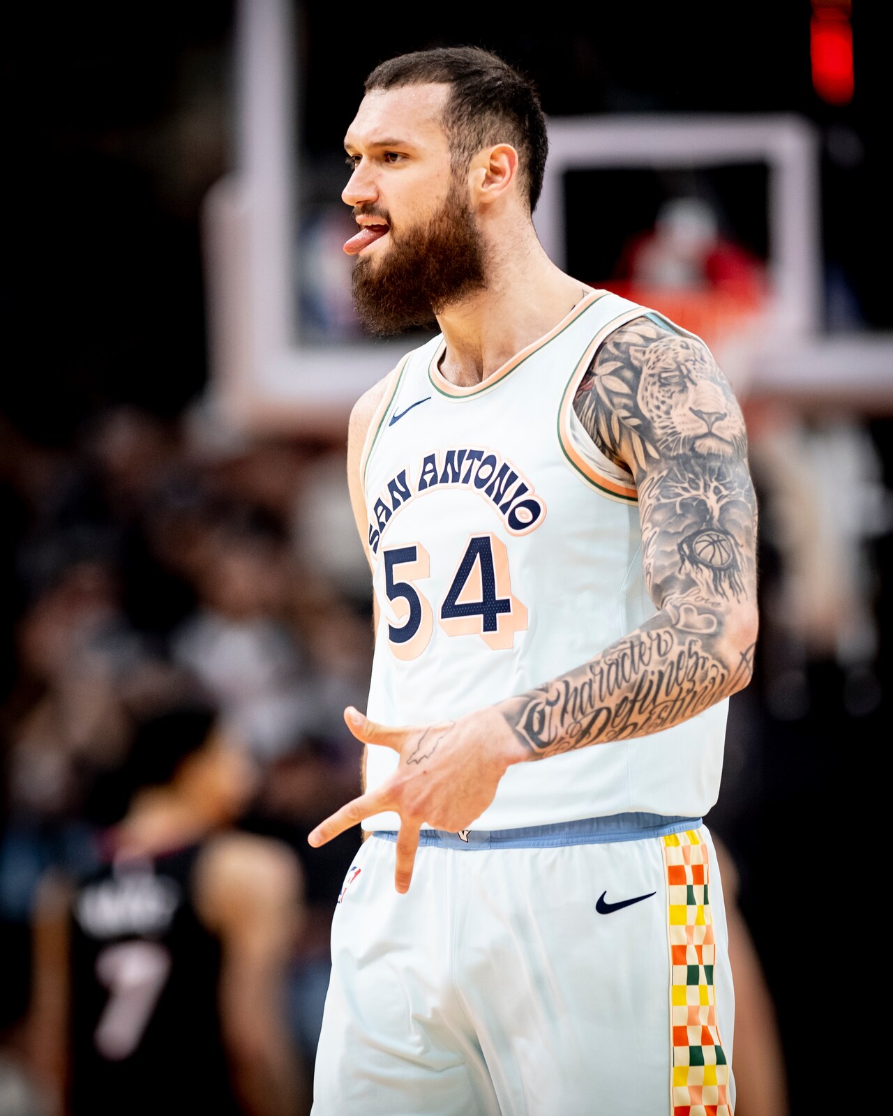Sandro Mamukelashvili lion arm tattoos