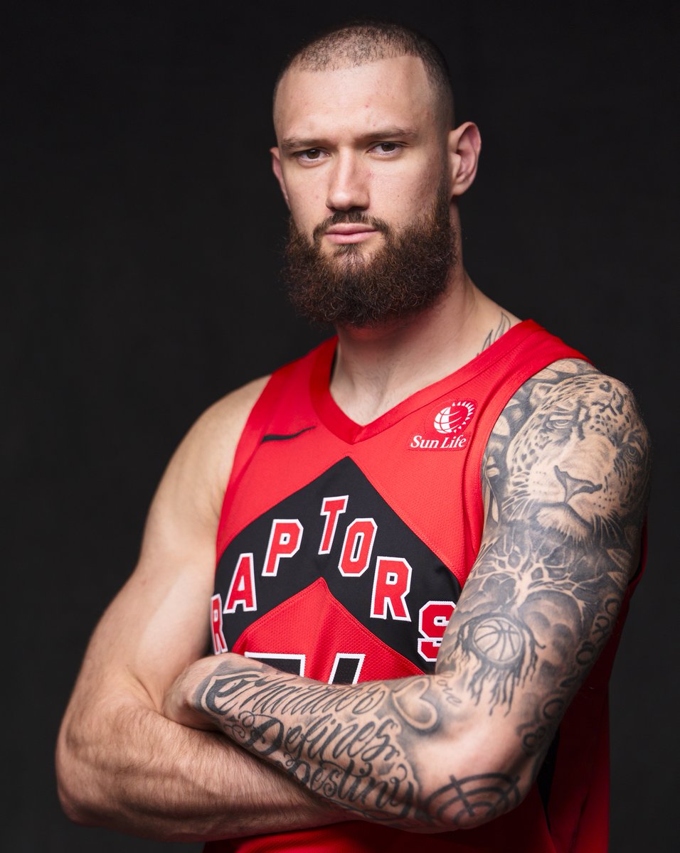 Sandro Mamukelashvili tiger and script tattoos