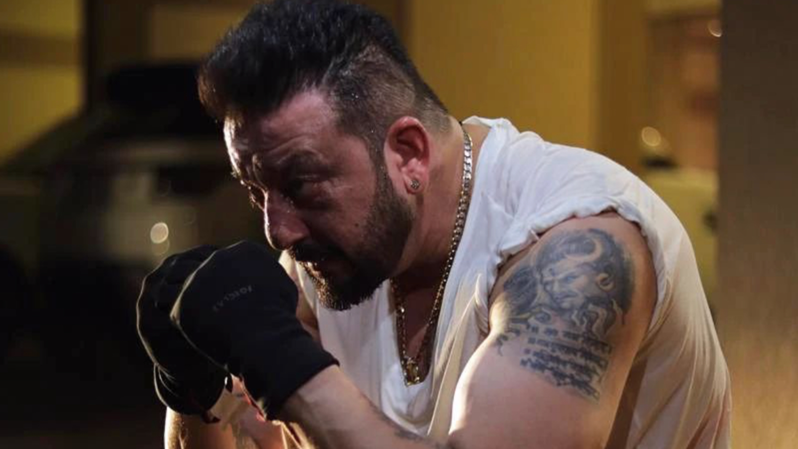 Sanjay Dutt arm tattoo