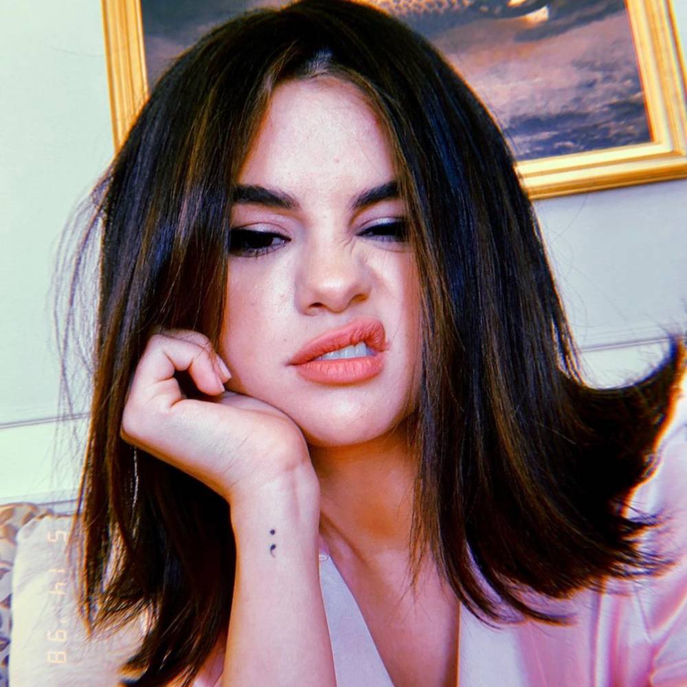 Selena Gomez semicolon wrist tattoo