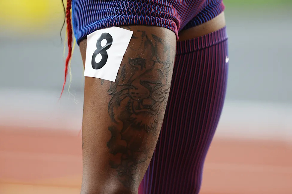Sha’Carri Richardson lion tattoo on her right thigh