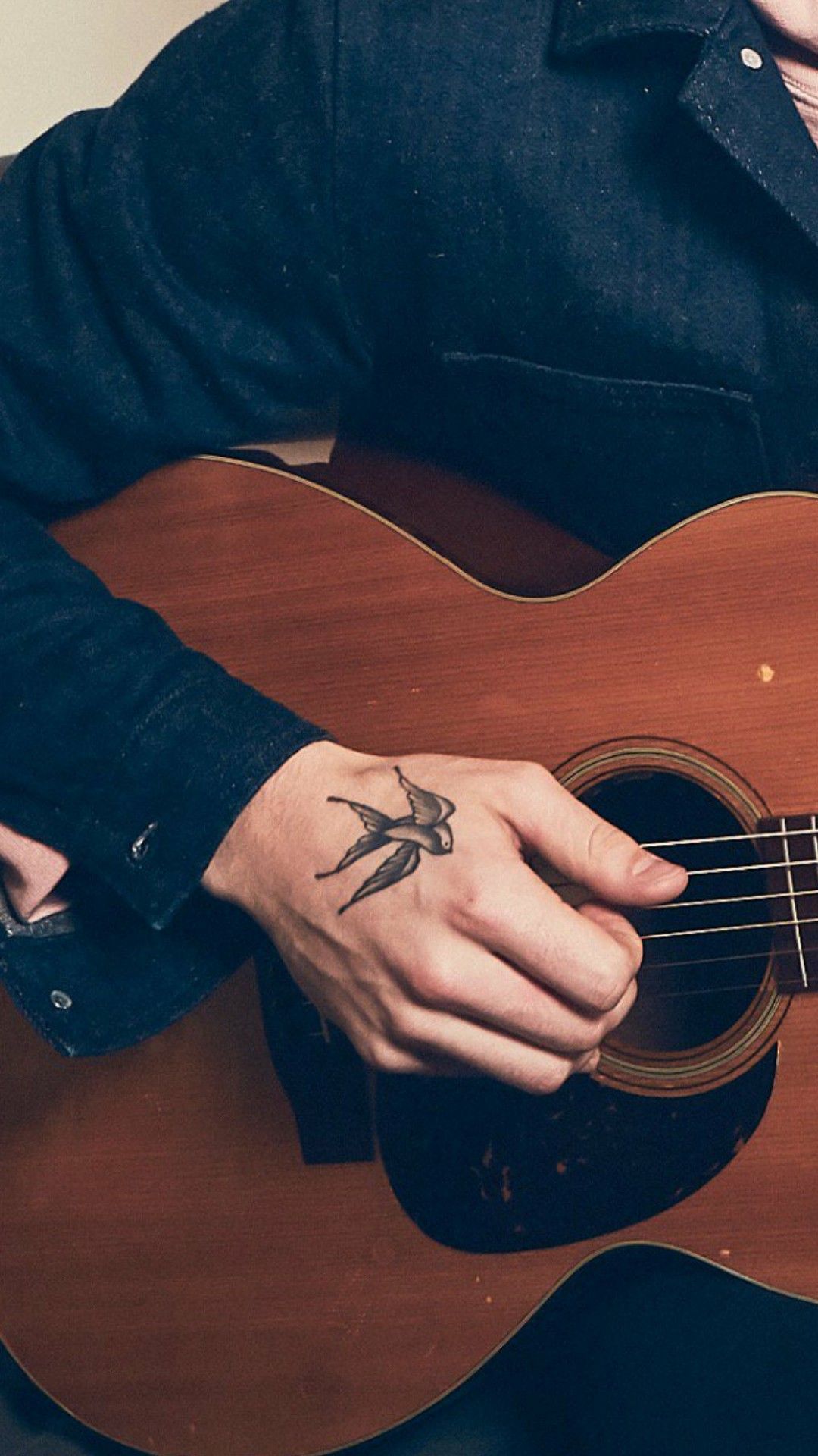 Shawn Mendes butterfly tattoo on the bicep