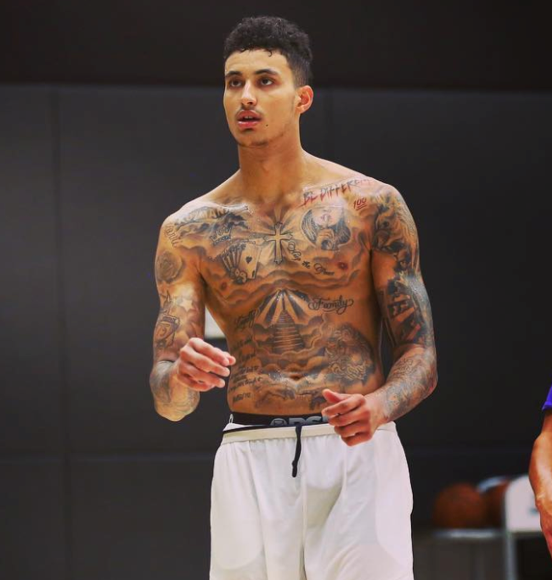 Kyle Kuzma chest and arm tattoos in a high-quality practice portrait