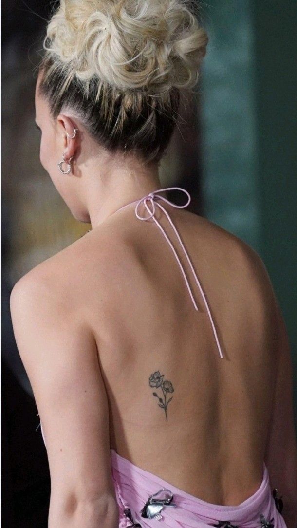 Millie Bobby Brown rose tattoo on her back