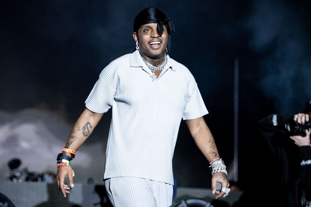 Ski Mask the Slump God arm tattoos on stage