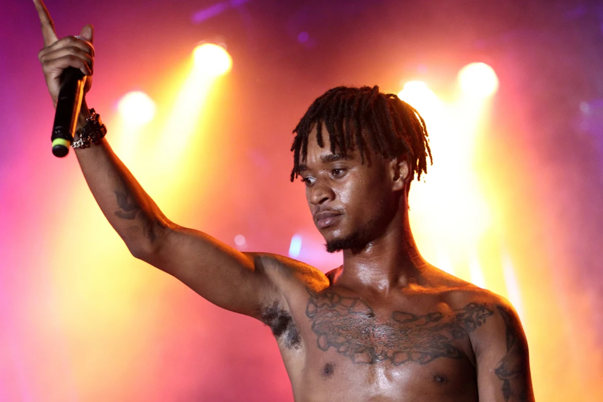 Slim Jxmmi festival chest tattoos