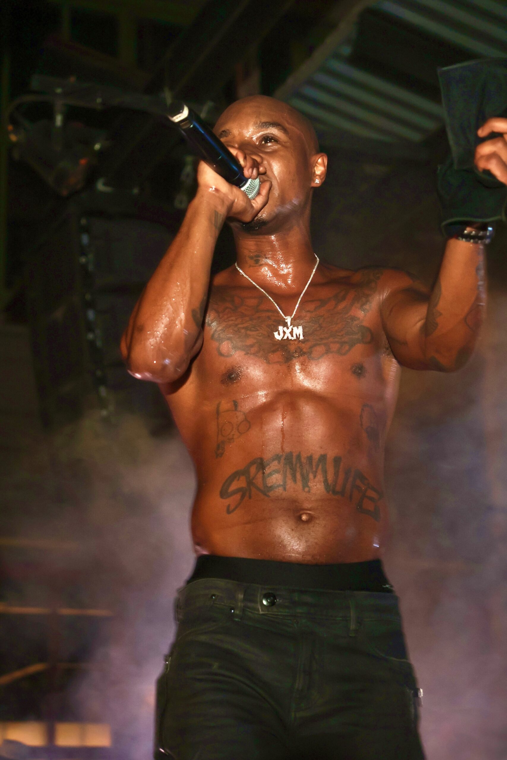 Slim Jxmmi live torso tattoos