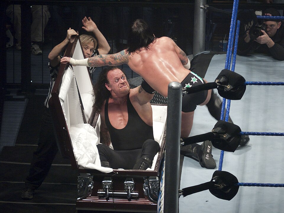 The Undertaker shoulder and arm ink