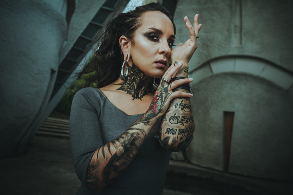 Tatiana Shmayluk throat tattoo