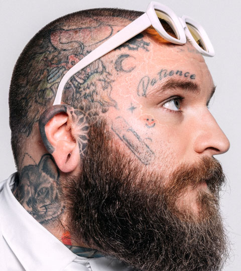 Teddy Swims Patience face tattoo and scalp tattoos