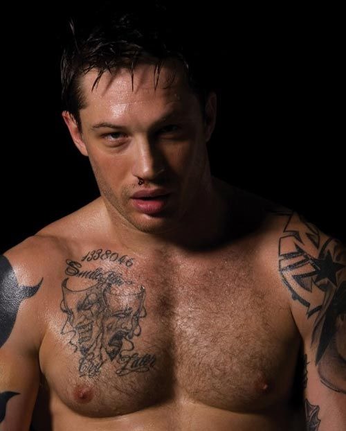 Tom Hardy tattoo collection visible in a torso photograph