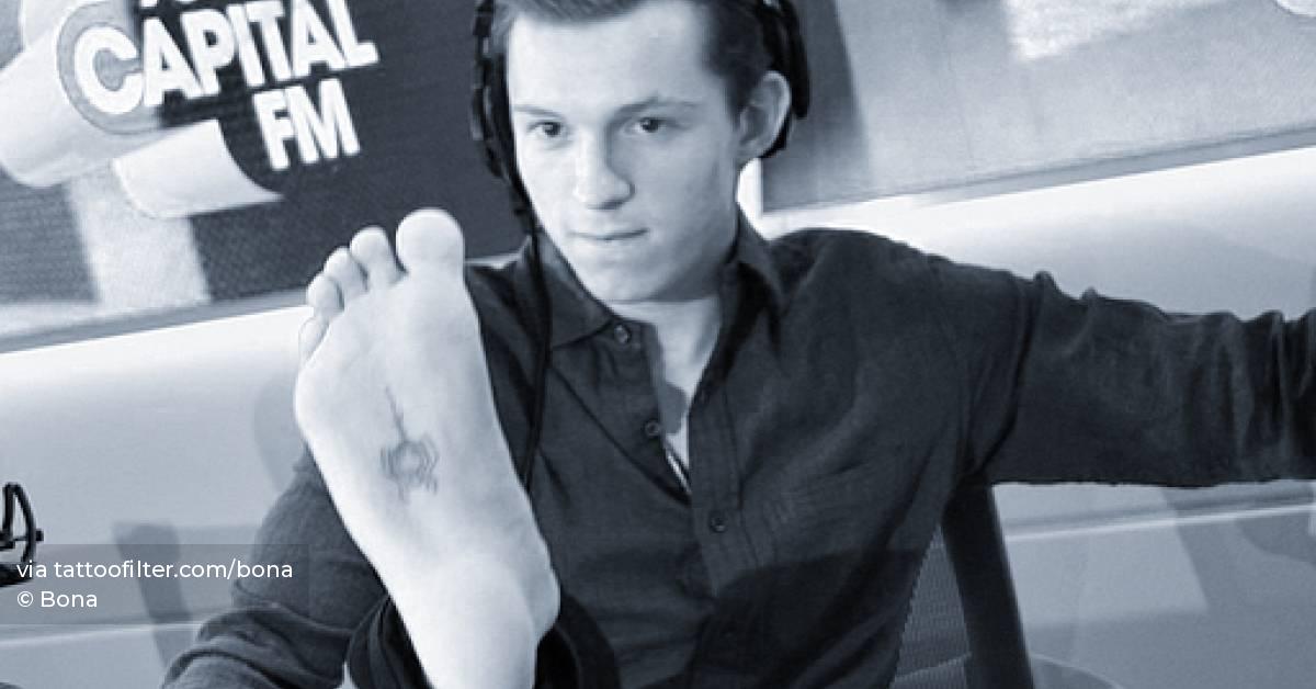 Tom Holland the spider-man emblem sits on the sole of his foot
