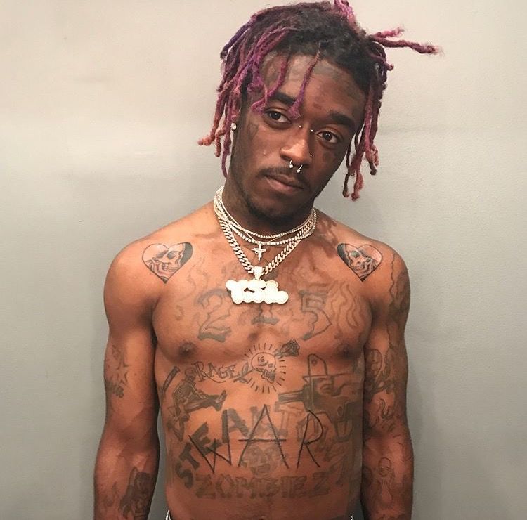 Lil Uzi Vert torso and forehead tattoo details