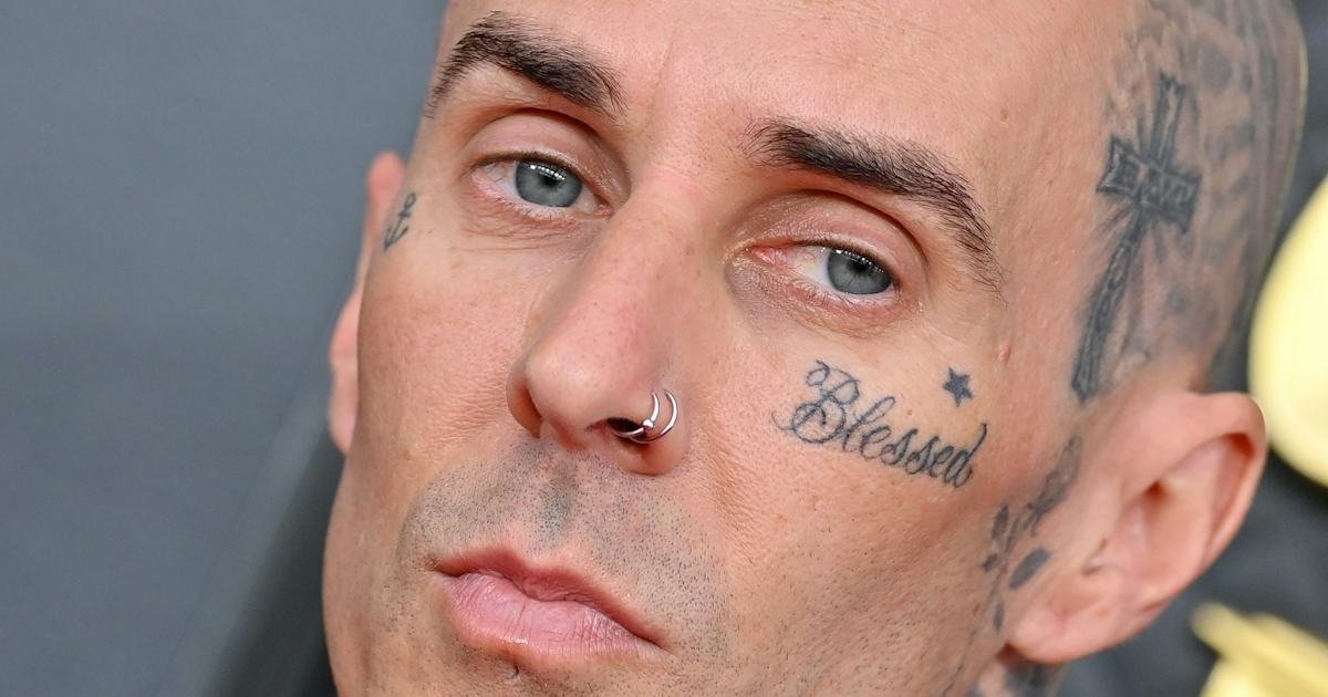 Travis Barker Blessed face tattoo