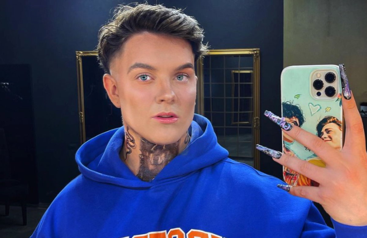 Twenty4Tim neck tattoos in a mirror selfie