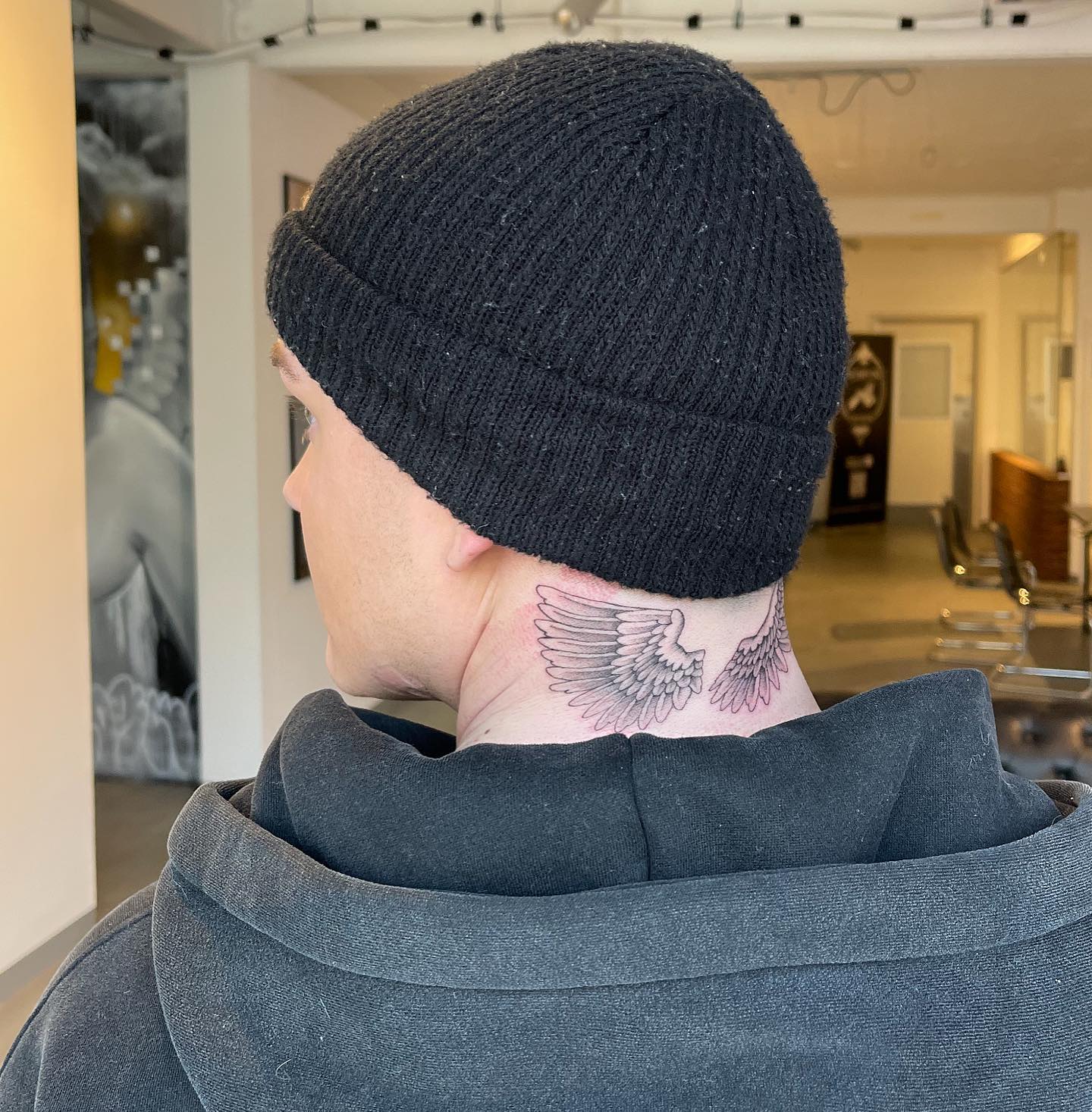 Twenty4Tim neck wings side tattoo
