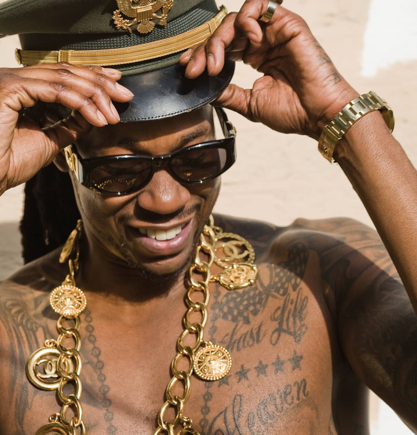 Two Chainz torso tattoo portrait