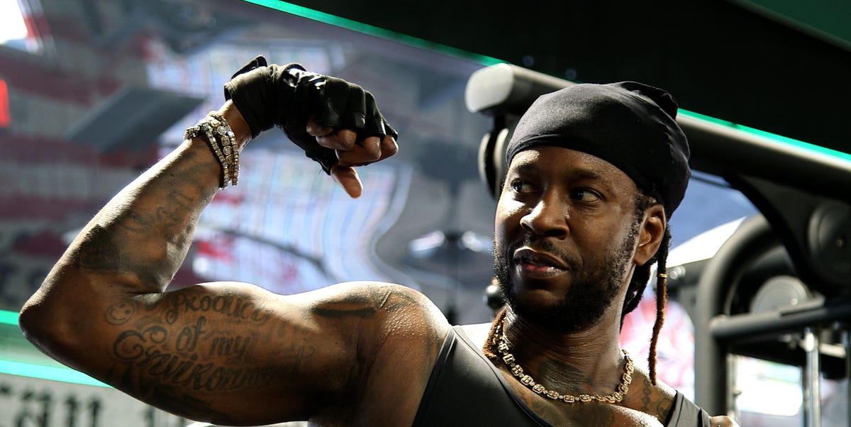 Two Chainz workout arm tattoos