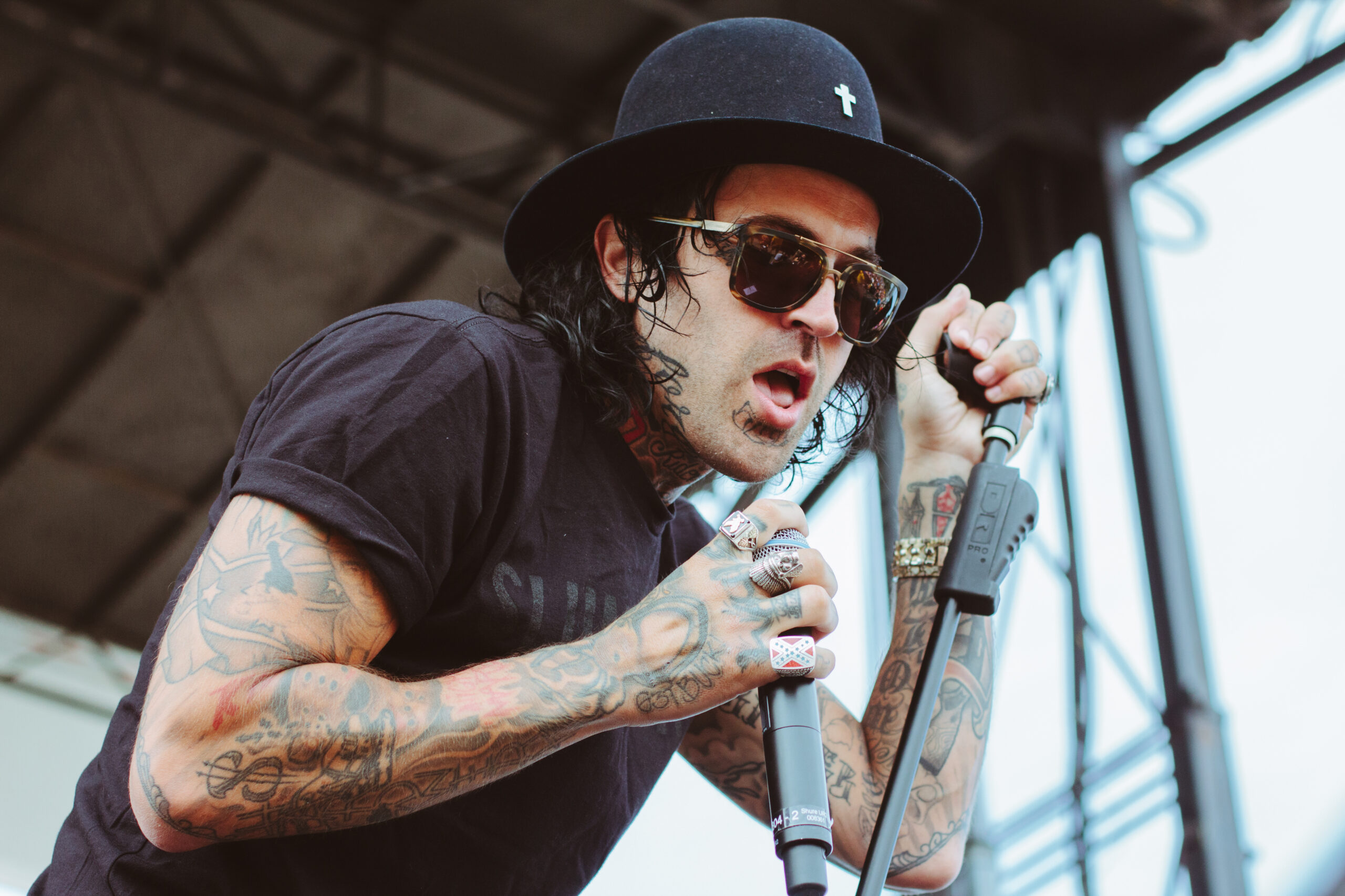 Yelawolf arm tattoos with microphone